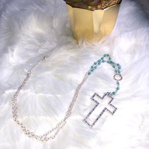 Silver tone cross with turquoise colored beads